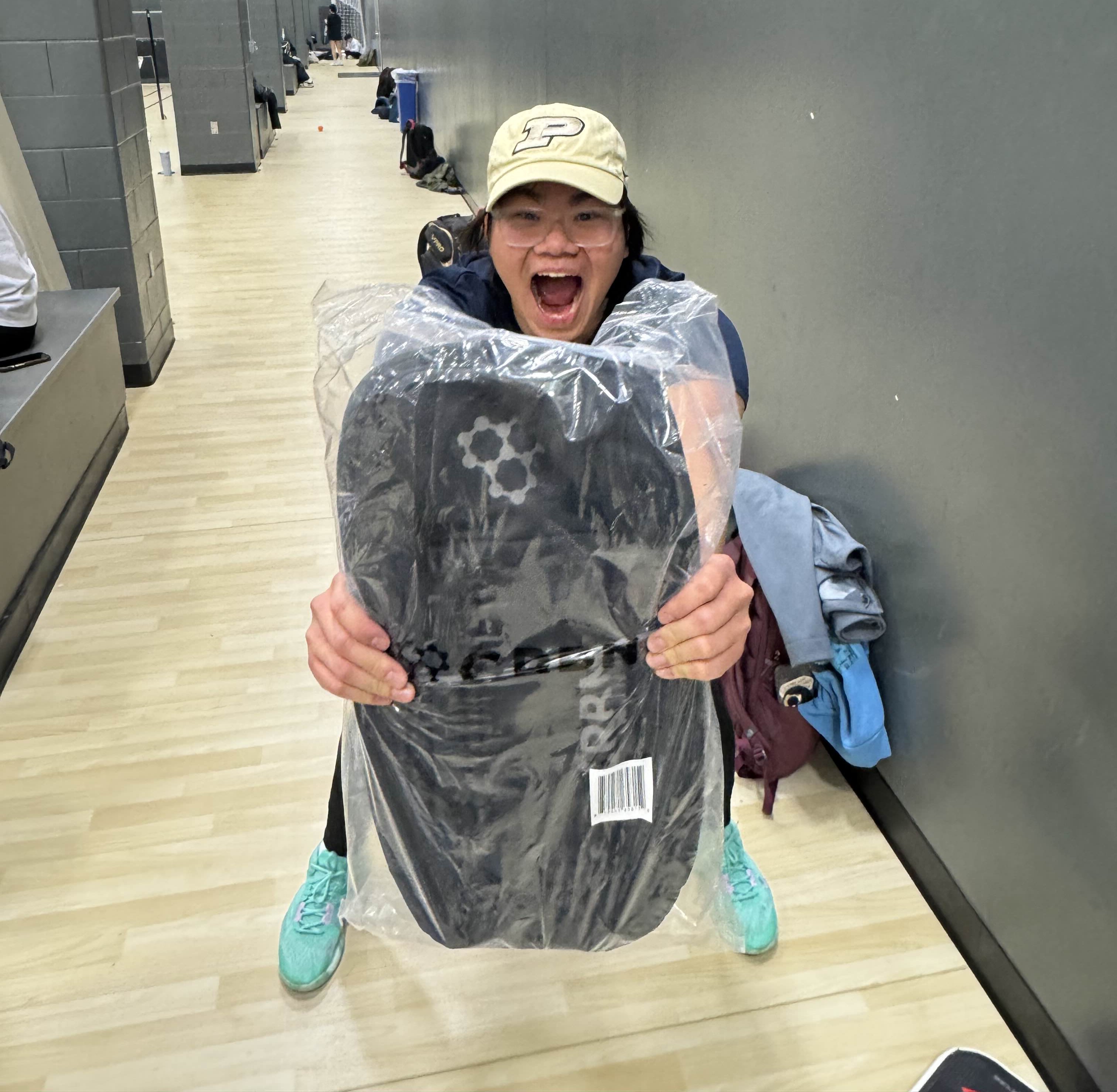 Club member with a paddle won through attendance points
